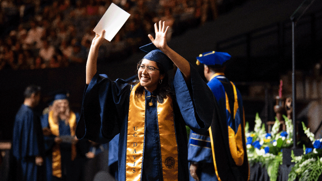 Undergraduate celebrates at the 2023 UC Davis Commencement. 