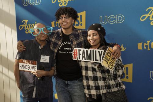 Family poses for a celebratory picture at the Chancellor's Residence on Aggie Day on April 8, 2023.